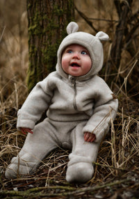 Overall fleece cu glugă, mănuși și botoși din lână merinos - Teddy Bear Melange Offwhite Mikk-line HipHip.ro