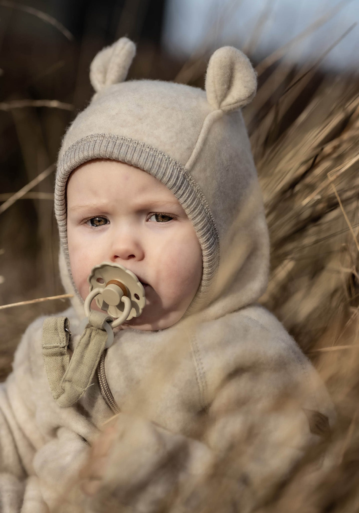 Overall fleece cu glugă, mănuși și botoși din lână merinos - Teddy Bear Melange Offwhite Mikk-line HipHip.ro